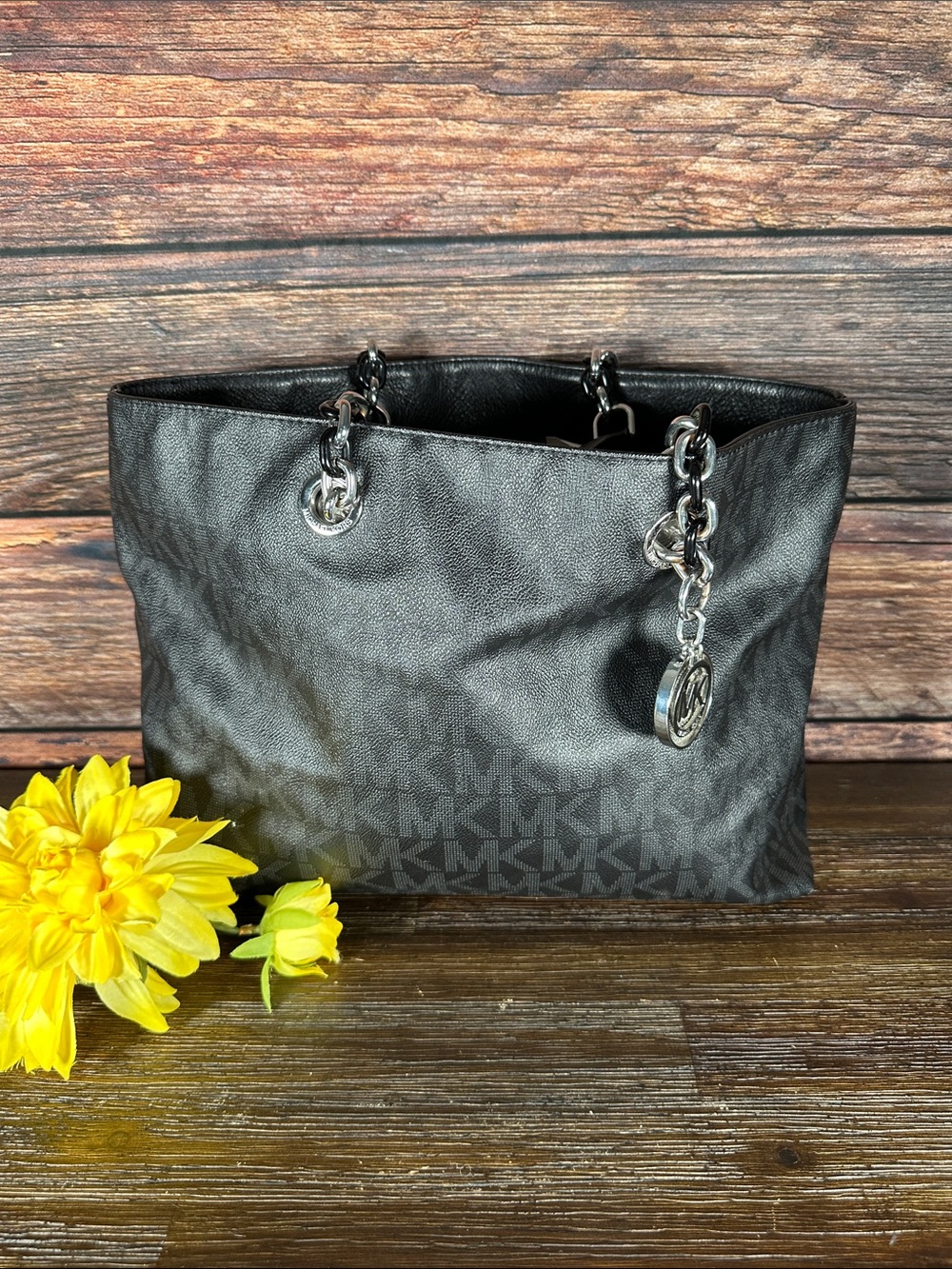 Michael Kors Cynthia Large Tote in black signature logo canvas.